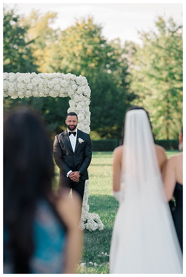 groom reaction walking down aisle 