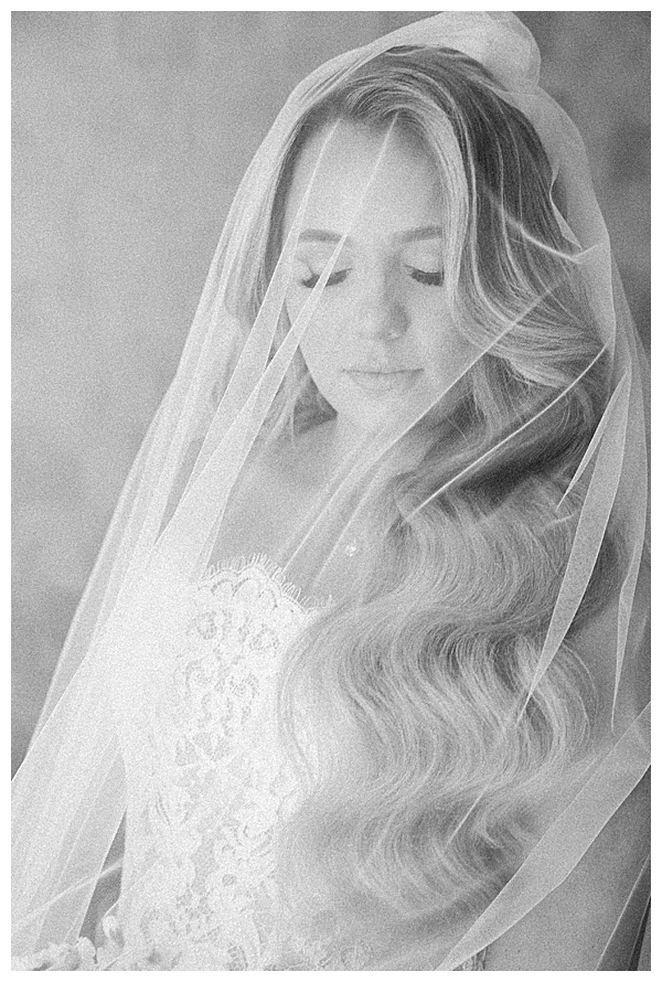 Bride smiling in bridal suite at Hamilton Manor wedding