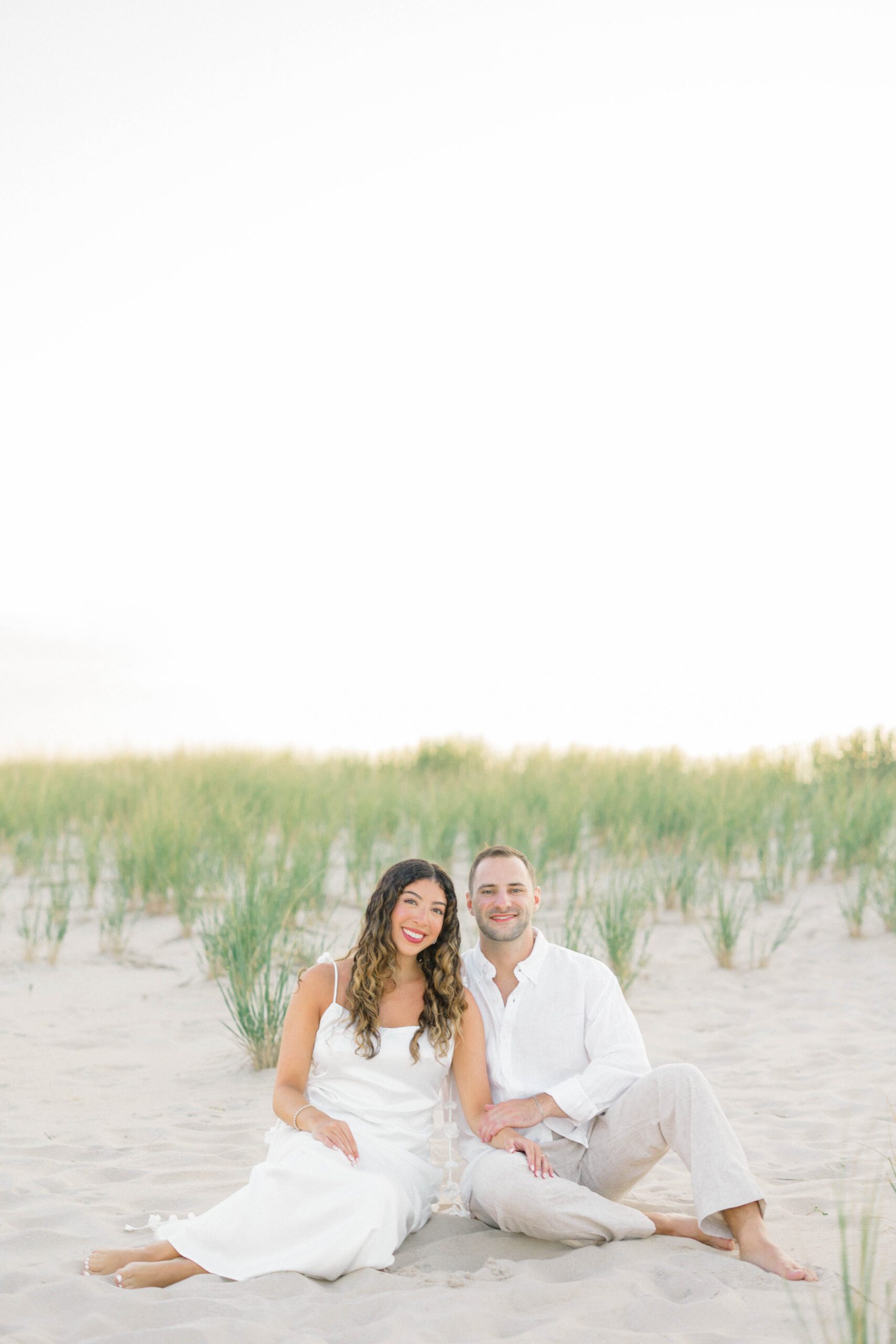 Long Beach Island engagement photographer captures Rachel and Ben at golden hour by the bay