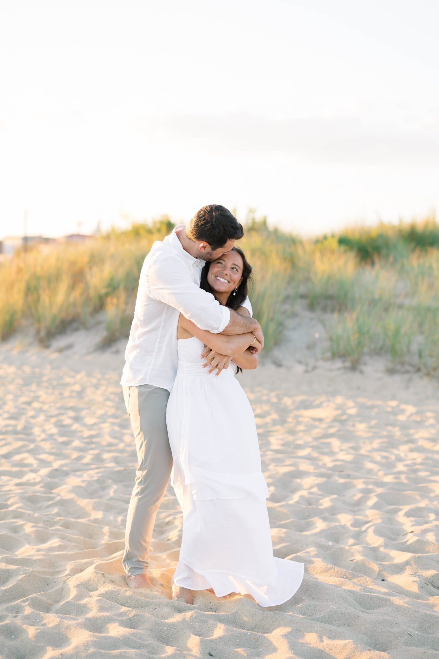 New Jersey shore engagement photographer documenting a romantic moment between an engaged couple