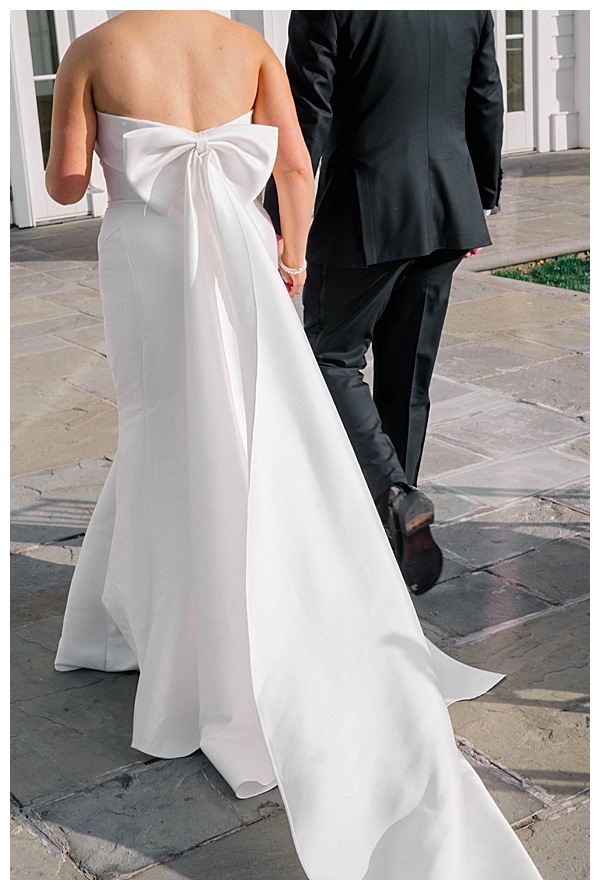 bride with bow detail on her dress