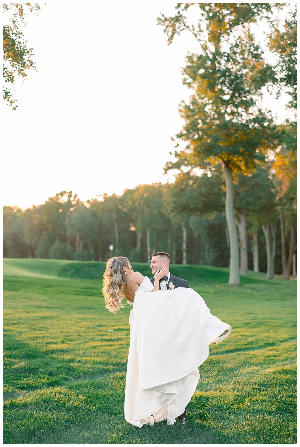 Bride and groom portraits photographed at twilight on the grounds of their Farmingdale, NJ wedding venue