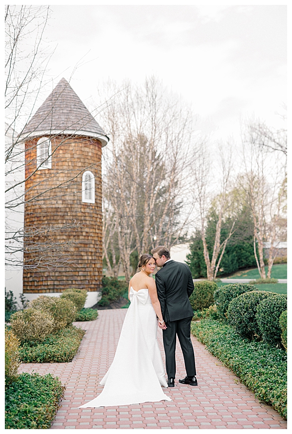 Bridal portrait with flowing veil in the natural spring light at the Ryland Inn, New Jersey