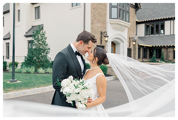 Outdoor bride and groom portraits on the manicured grounds of the venue