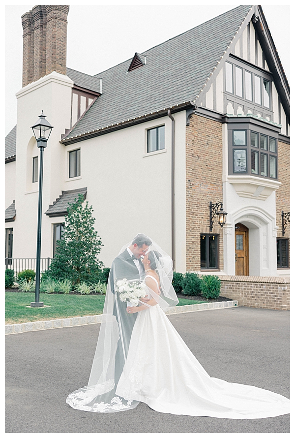Detail shot of Hannah's bridal gown before her black tie wedding ceremony