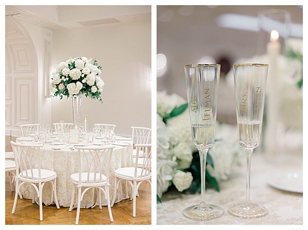 Lush white and green floral centerpieces on the reception tables