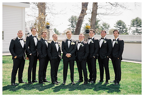 Groom and groomsmen portraits on the Ryland Inn grounds during a spring New Jersey wedding