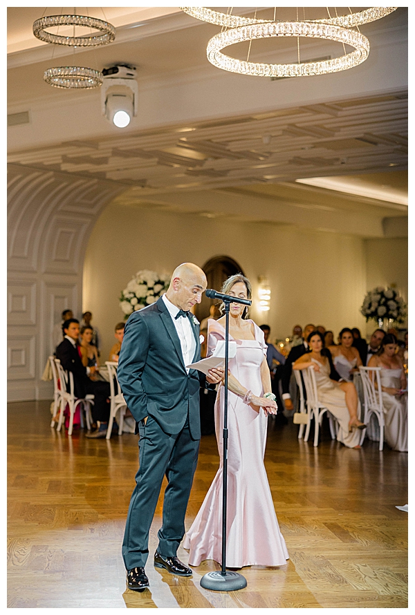 Parents give toast to bride and groom 