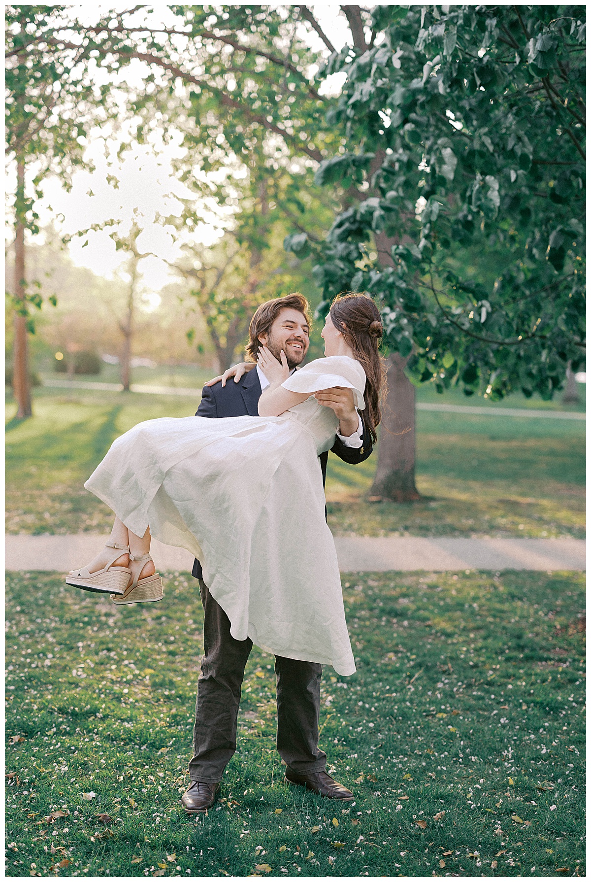Spring evening engagement portraits at Divine Park NJ with warm glowing sky