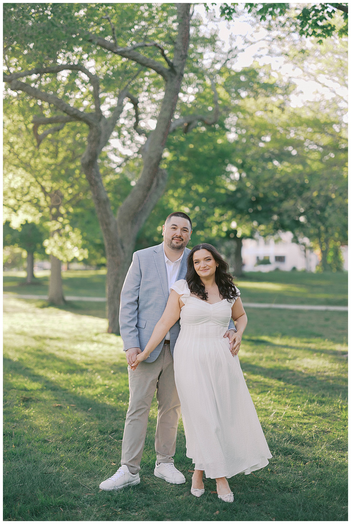 Couple embracing during golden hour New Jersey engagement session at the Shore
