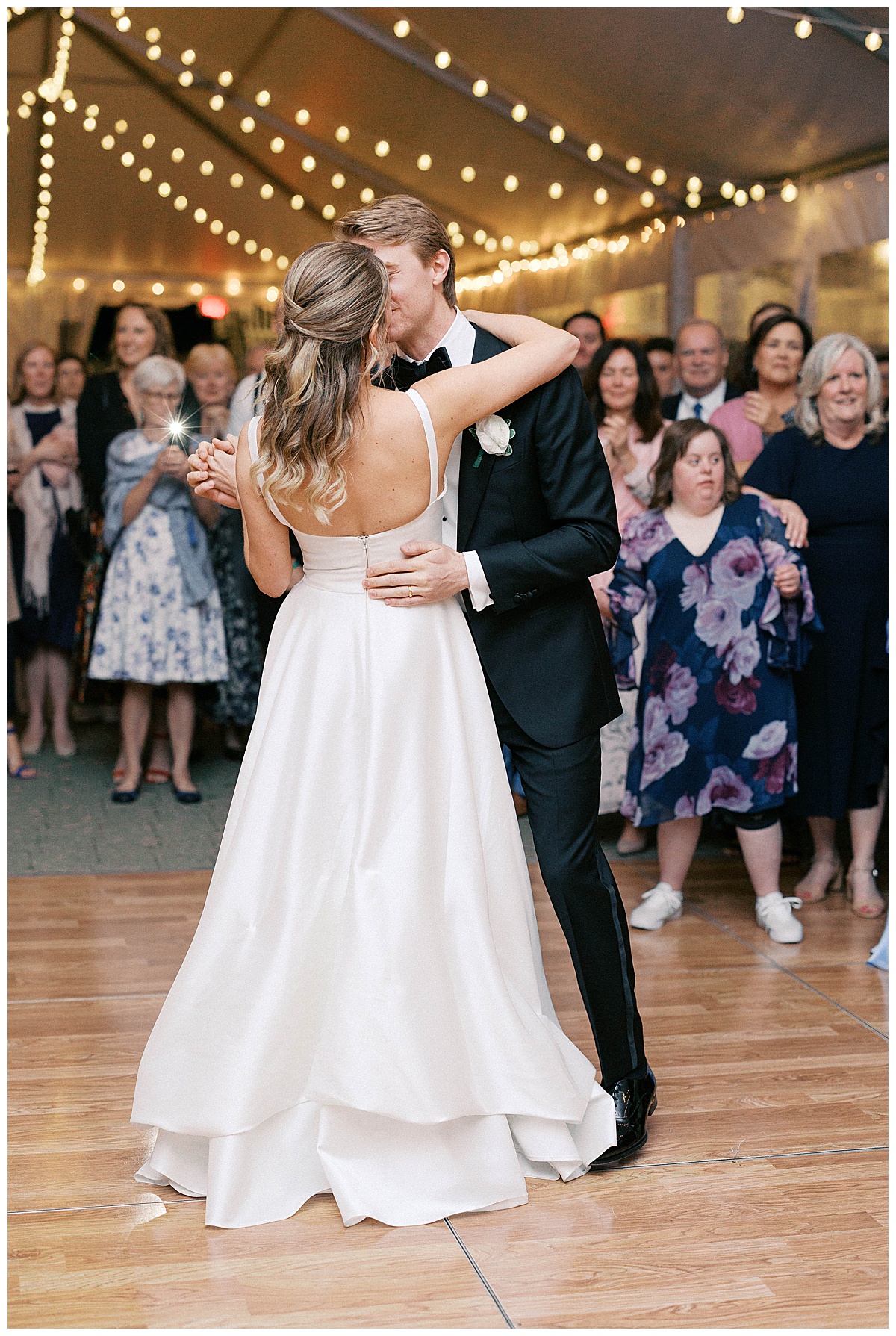 Maggie and Mark dancing under tent Spring Lake wedding