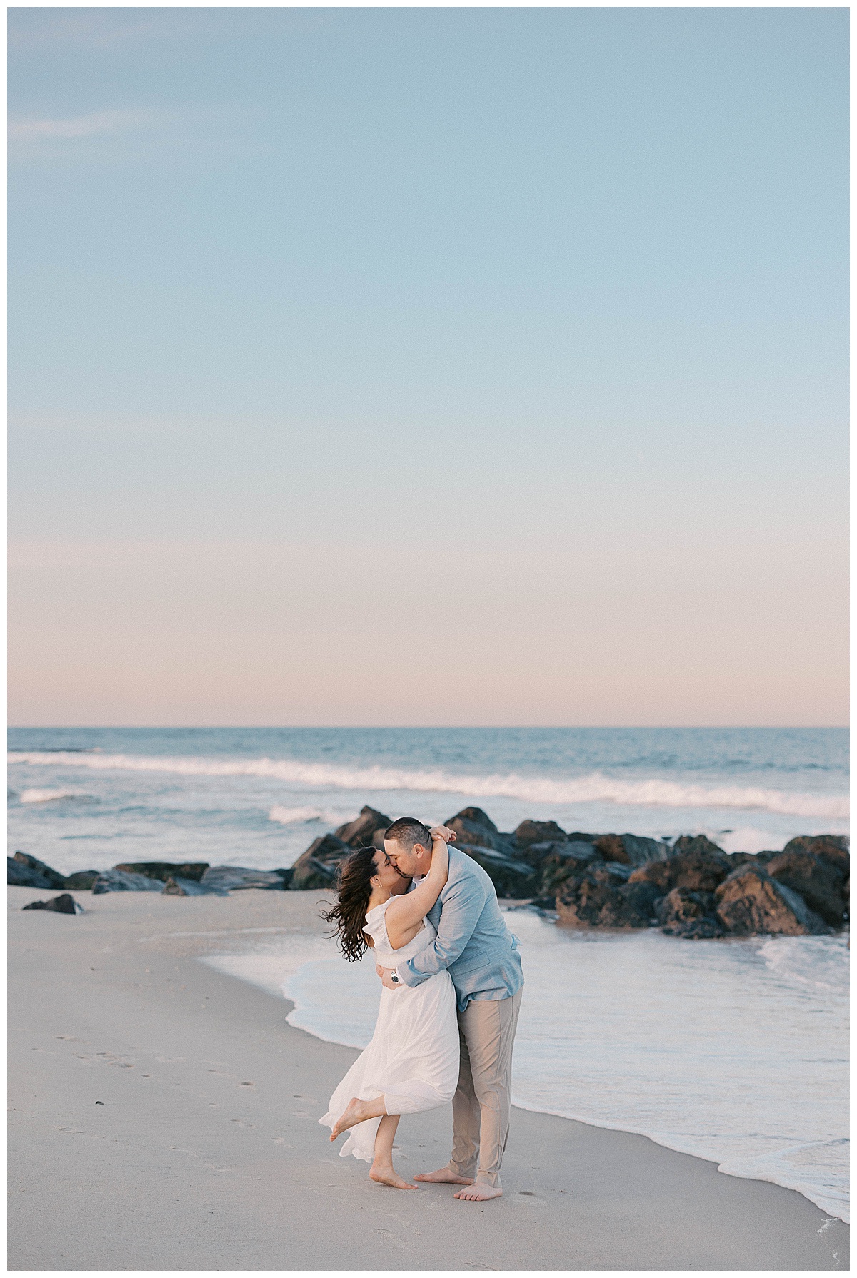 Sea Girt Beach engagement golden hour portrait with ocean in the background